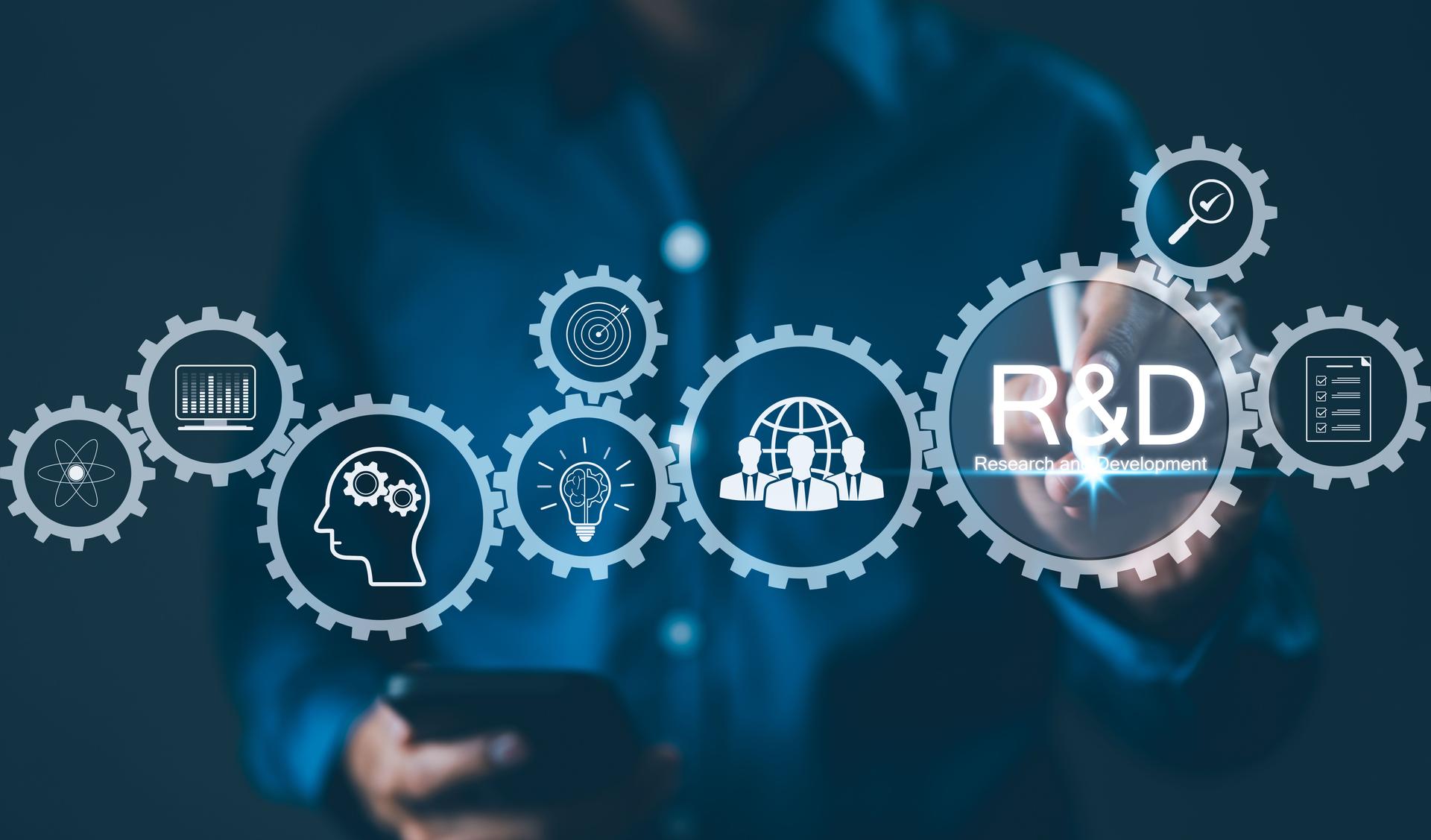 Businessman interacting with digital icons representing research and development (R&D) concepts, including innovation, technology, and human resources, symbolizing strategic growth and innovation.